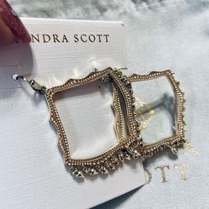 Kendra Scott Gold Lacey earrings.